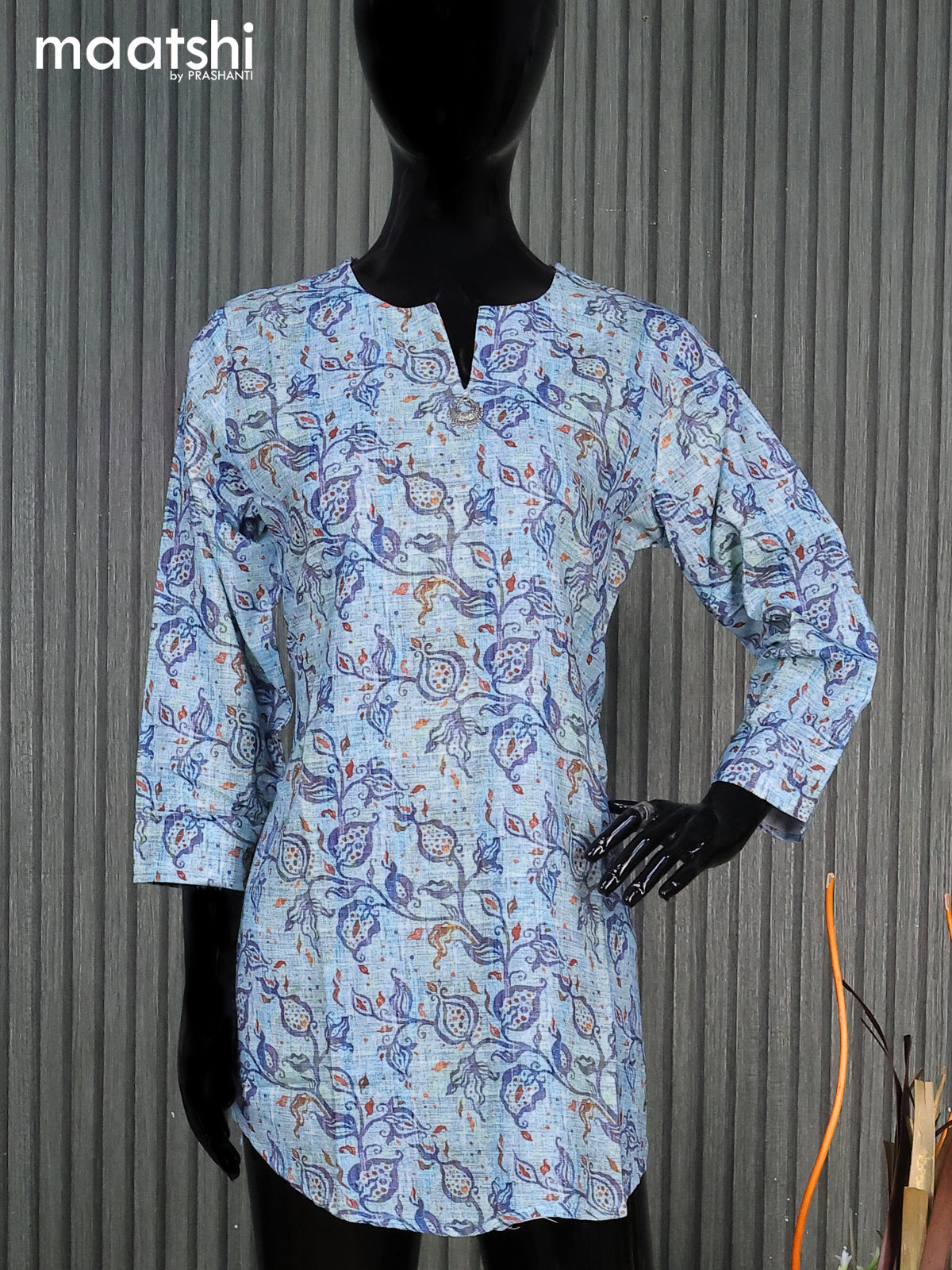 Rayon readymade short kurti pastel blue with allover prints & simple neck pattern without pant