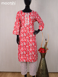 Cotton readymade kurti set red and off white with allover floral prints & simple neck pattern and straight cut pant