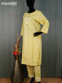 Cotton readymade kurti set lime yellow and off white with allover prints & simple neck pattern and straight cut pant