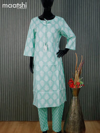 Cotton readymade kurti set pastel green and off white with allover butta prints and straight cut pant