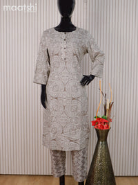 Cotton readymade kurti set sap green and off white with allover prints & simple neck pattern and straight cut pant