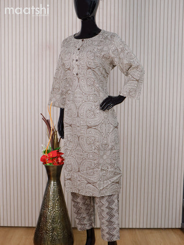 Cotton readymade kurti set sap green and off white with allover prints & simple neck pattern and straight cut pant