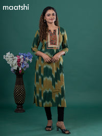 Cotton readymade kurti green and mustard shade with allover ikat prints & ajrakh patch work neck pattern without pant