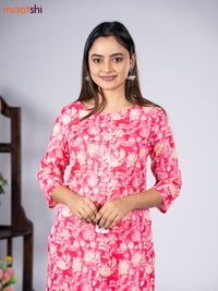 Cotton readymade kurti set pink and off white with allover floral prints & simple neck pattern and straight cut pant