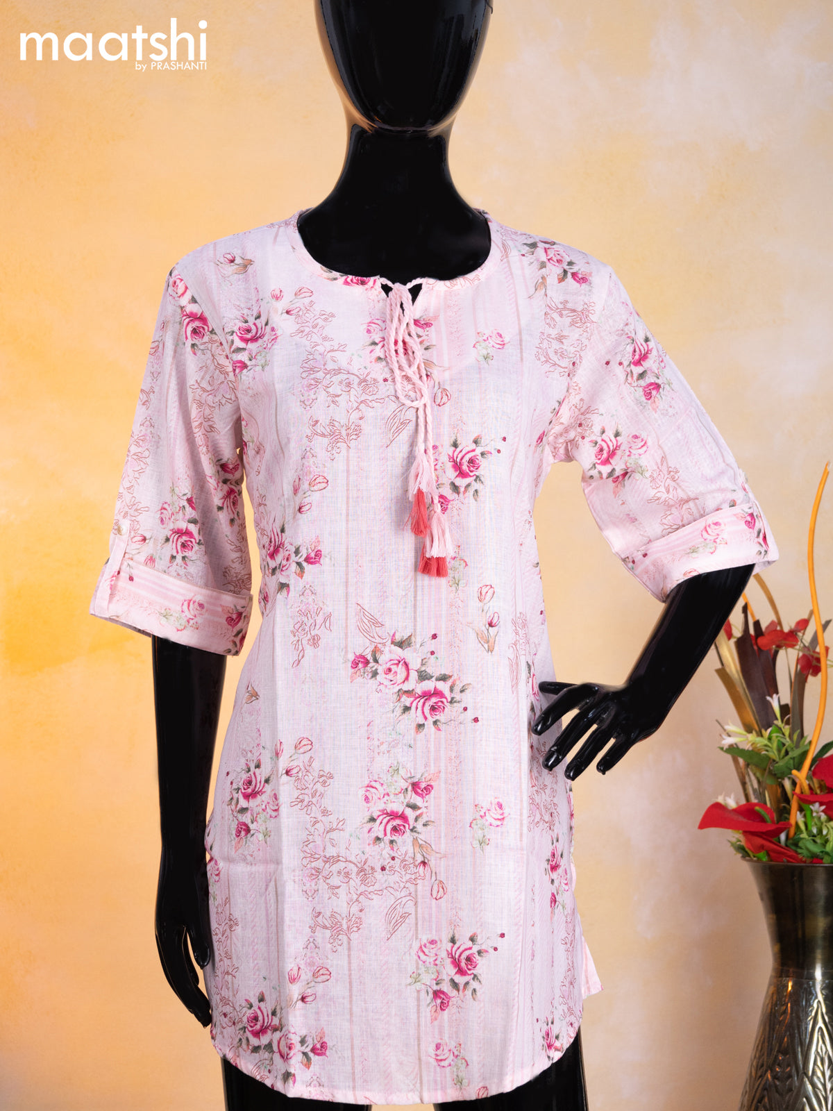 Cotton readymade short kurti baby pink with allover floral prints & simple neck pattern without pant