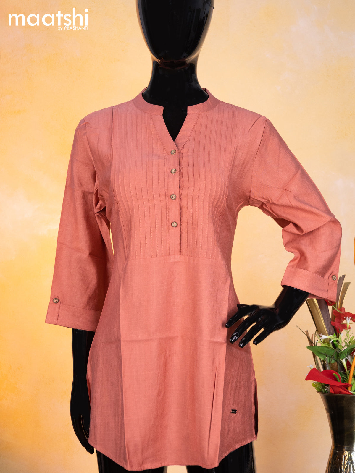 Rayon readymade short kurti pastel peach with plain body & simple neck pattern without pant