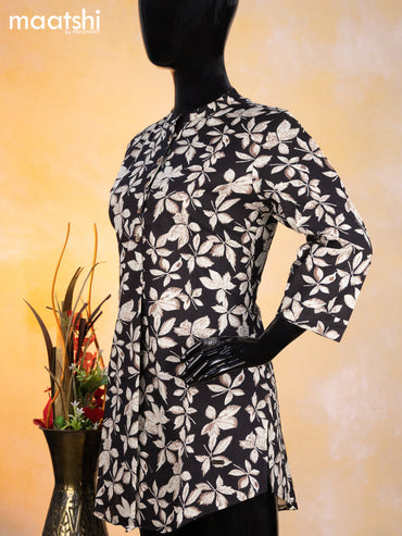 Cotton readymade short kurti black and beige with allover leaf prints & simple neck pattern without pant