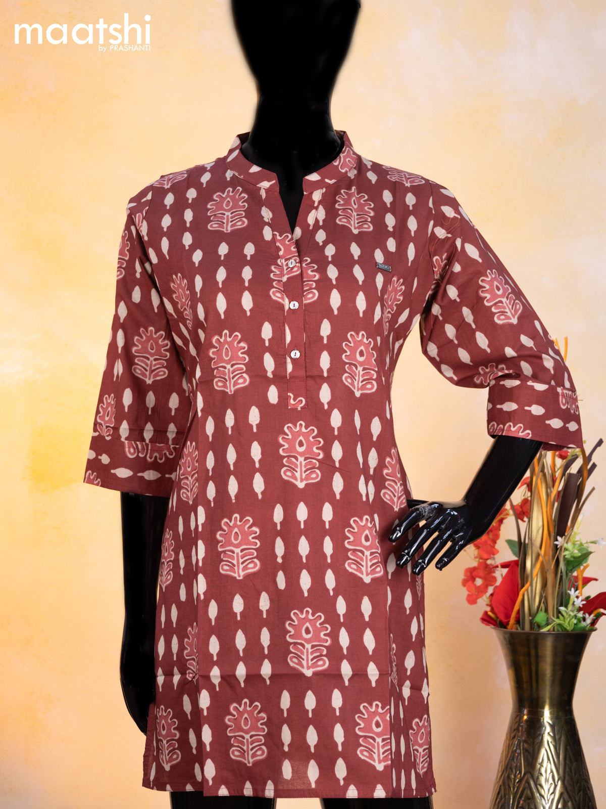 Cotton readymade short umbrella kurti maroon with allover prints & simple neck pattern without pant