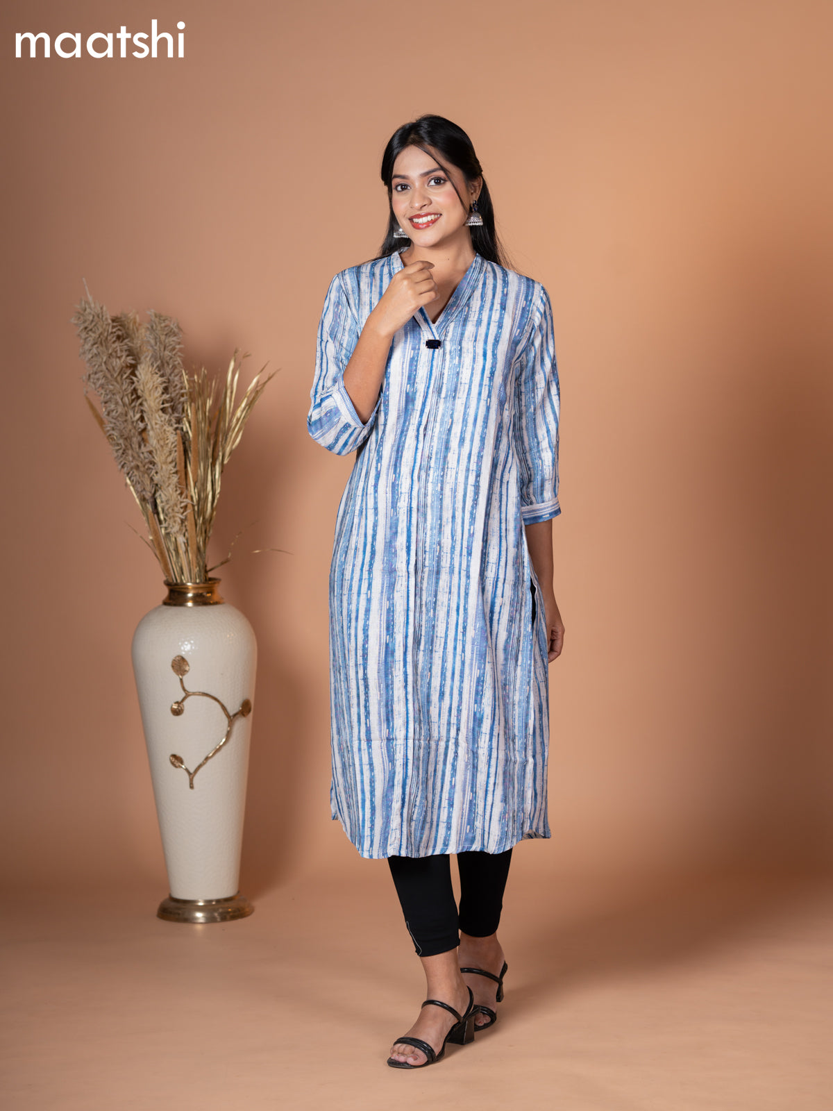 Rayon kurti blue and off white with allover prints & simple neck v pattern without pant