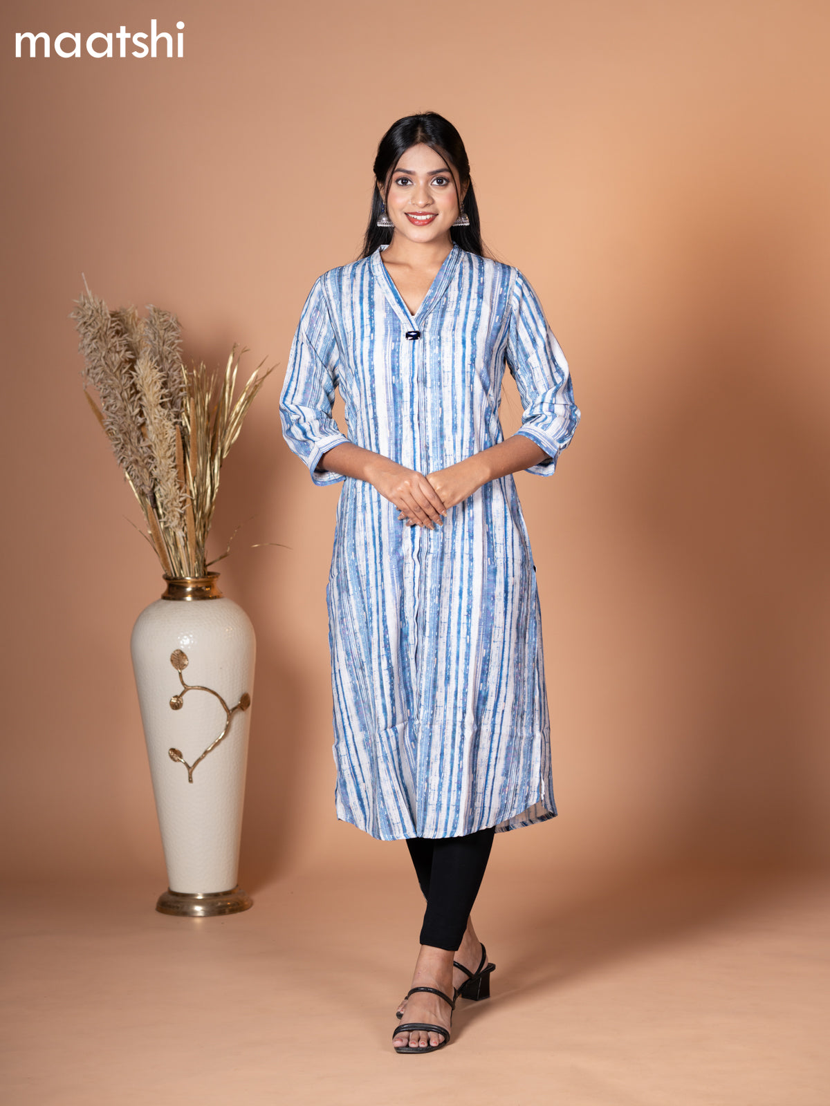 Rayon kurti blue and off white with allover prints & simple neck v pattern without pant