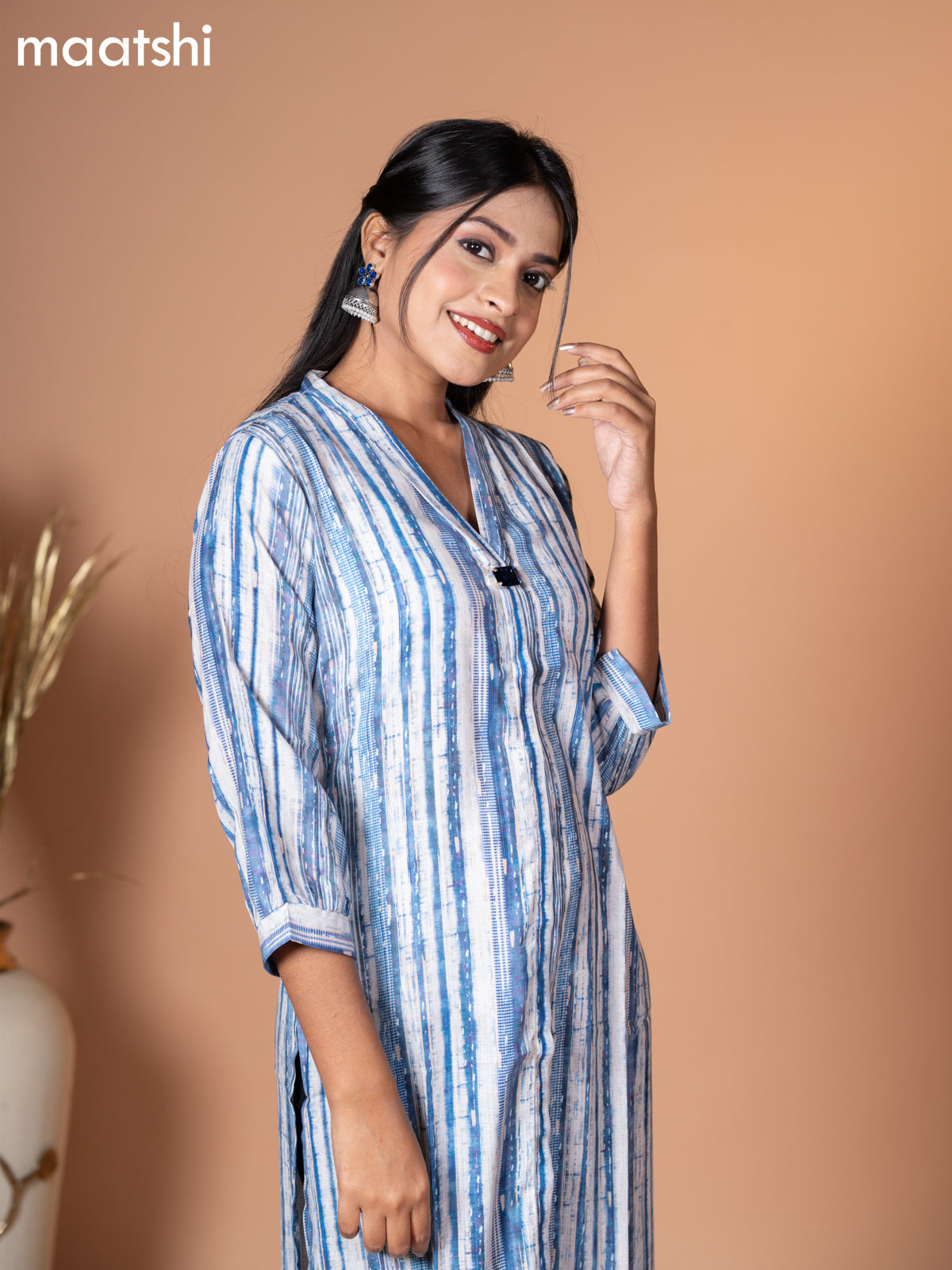 Rayon kurti blue and off white with allover prints & simple neck v pattern without pant