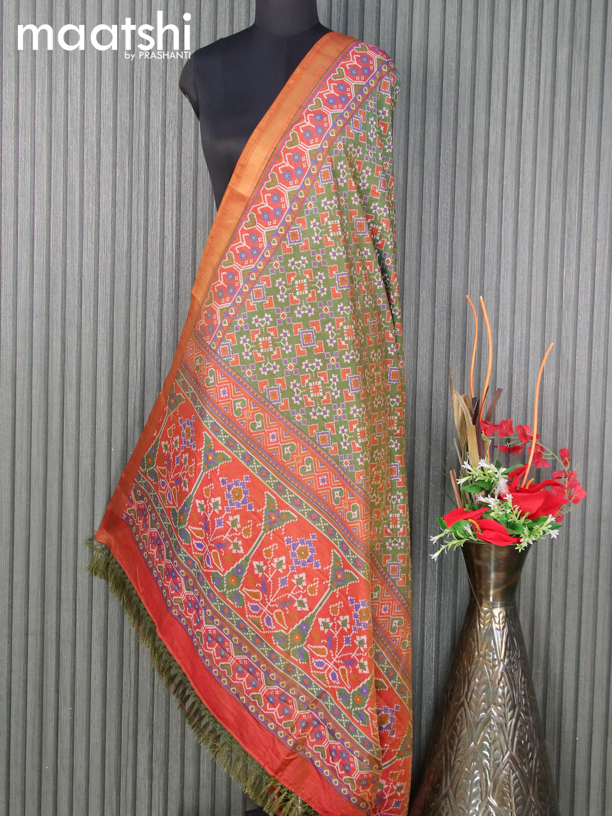 Semi tussar dupatta green shade and rust shade with allover ikat prints and zari woven border