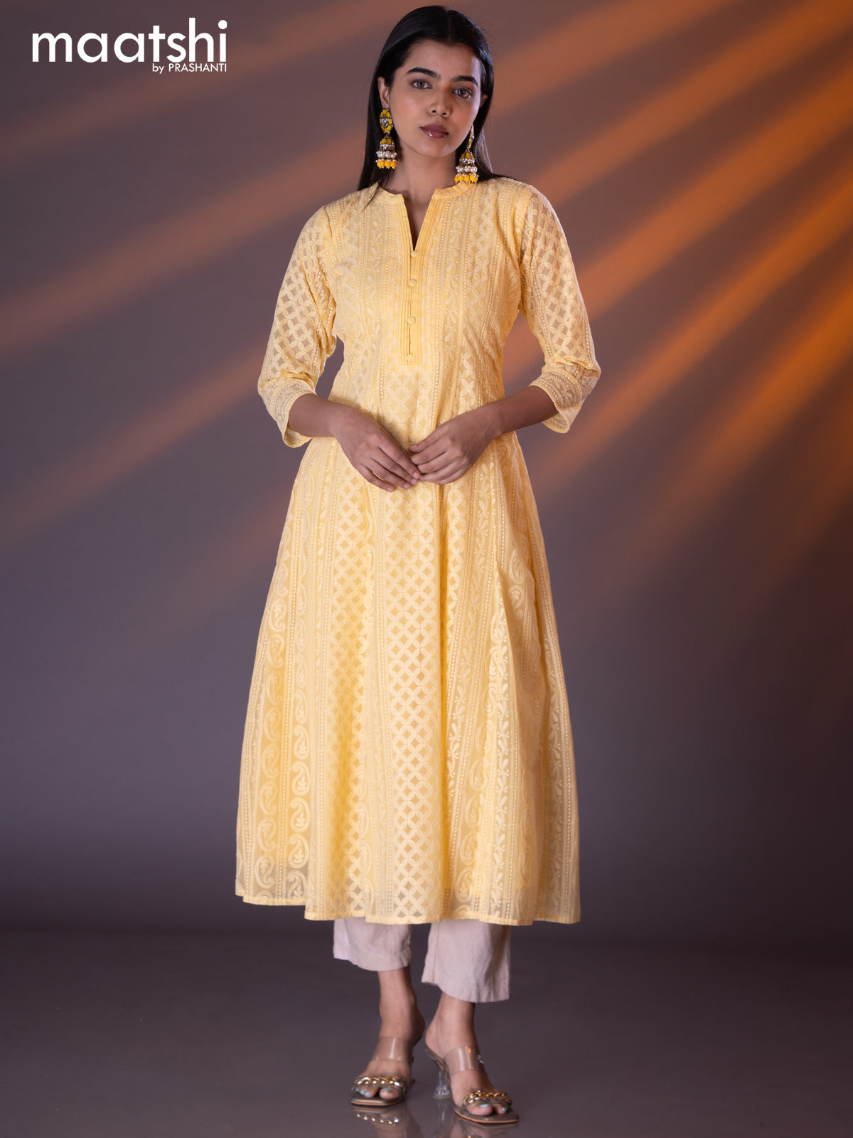 Semi georgette anarkali kurti yellow with allover chikankari work & simple neck pattern without pant