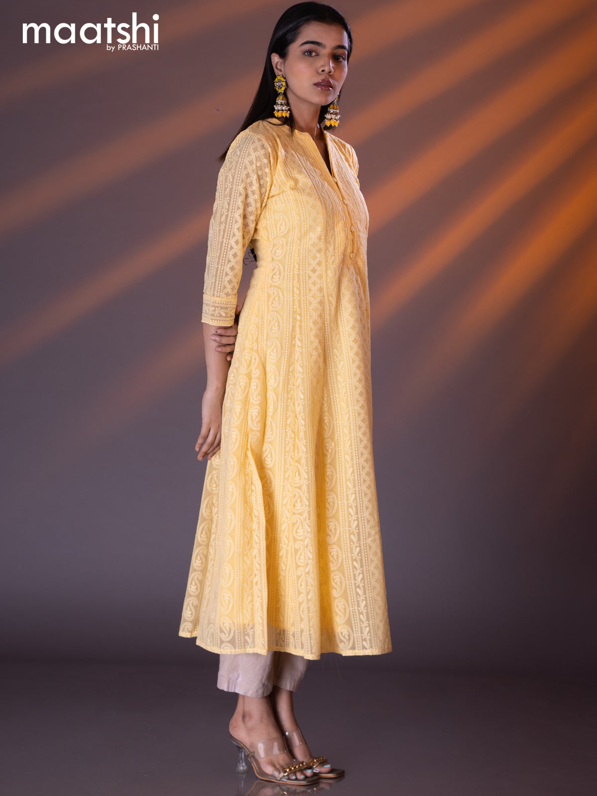 Semi georgette anarkali kurti yellow with allover chikankari work & simple neck pattern without pant