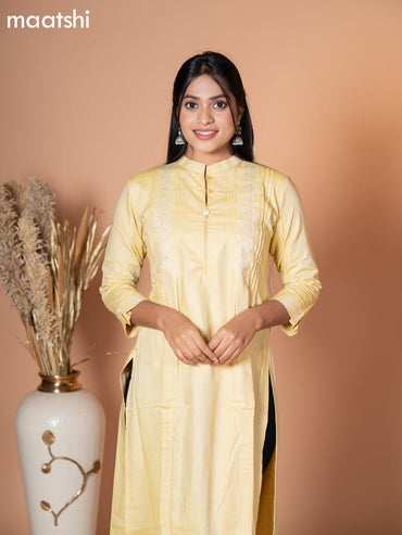 Rayon kurti pale yellow with embroidery work & simple neck pattern without pant