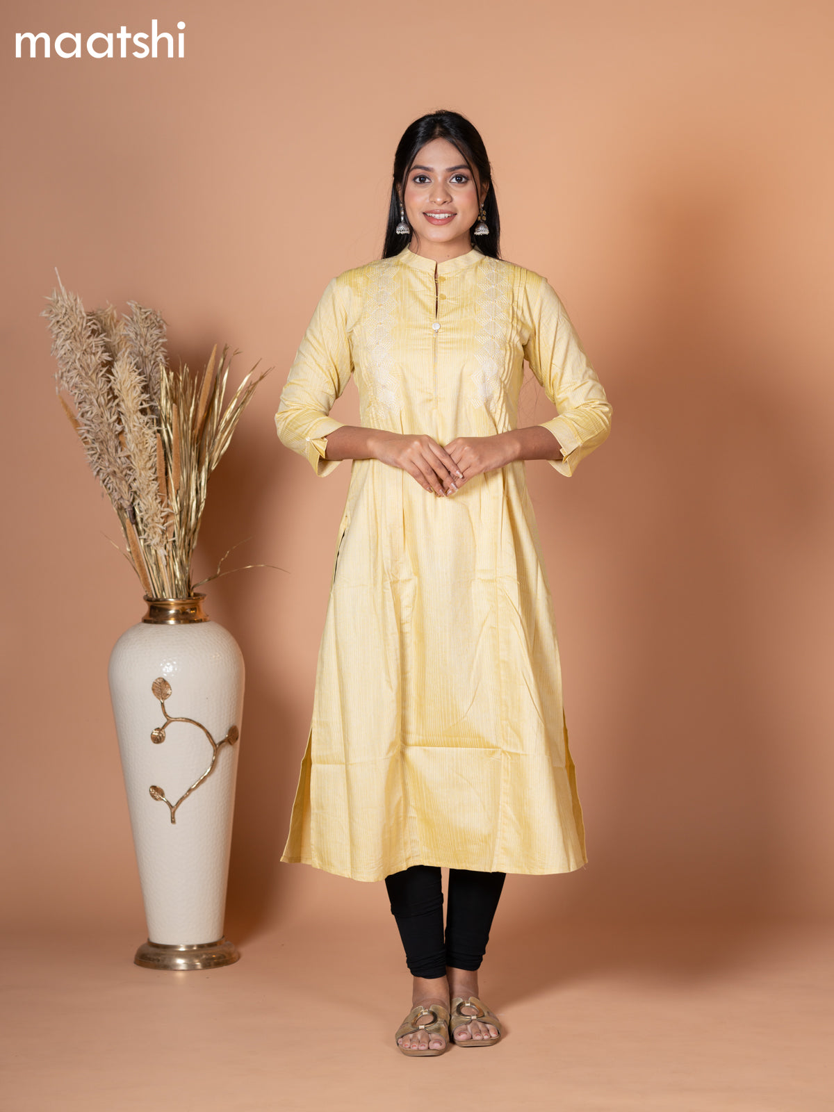 Rayon kurti pale yellow with embroidery work & simple neck pattern without pant