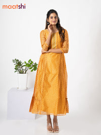 Chanderi floor length dress mustard shade with allover geometric prints & embroidery patch work neck pattern without pant