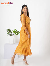 Chanderi floor length dress mustard shade with allover geometric prints & embroidery patch work neck pattern without pant