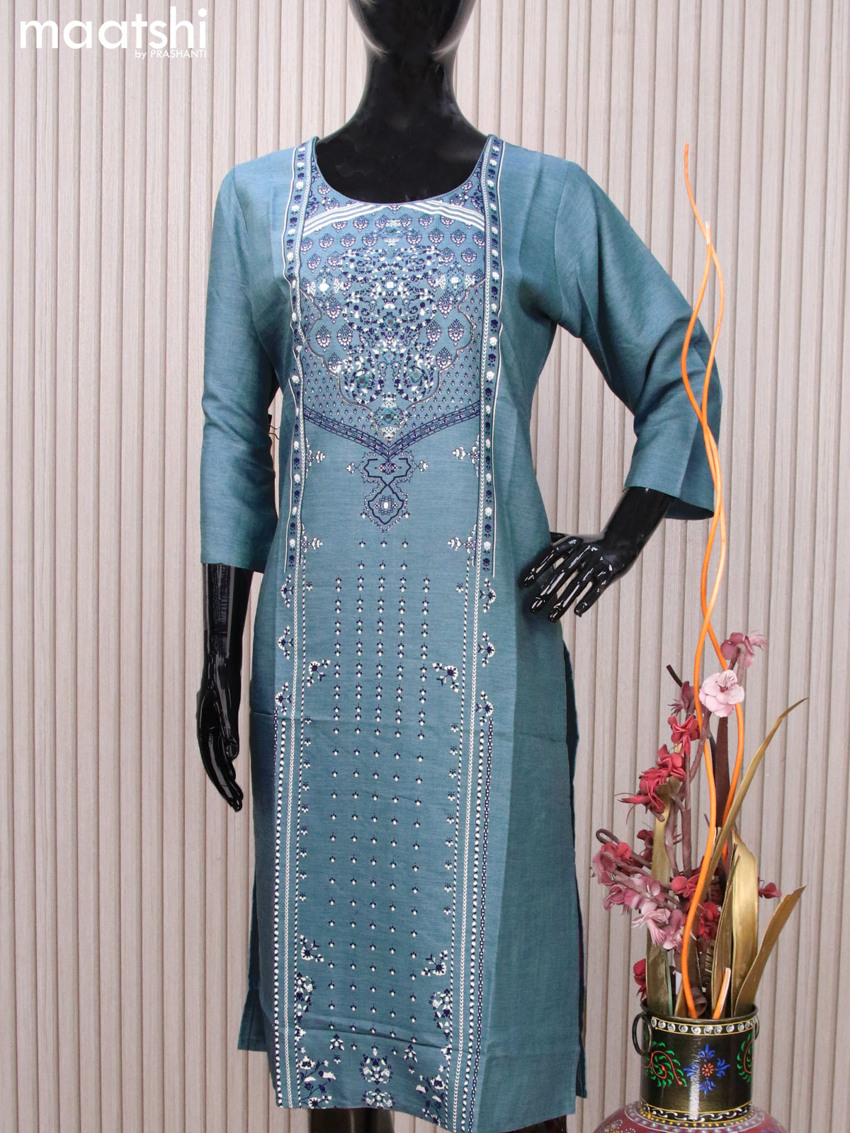 Rayon readymade kurti pastel blue shade with allover prints & mirror work neck pattern without pant