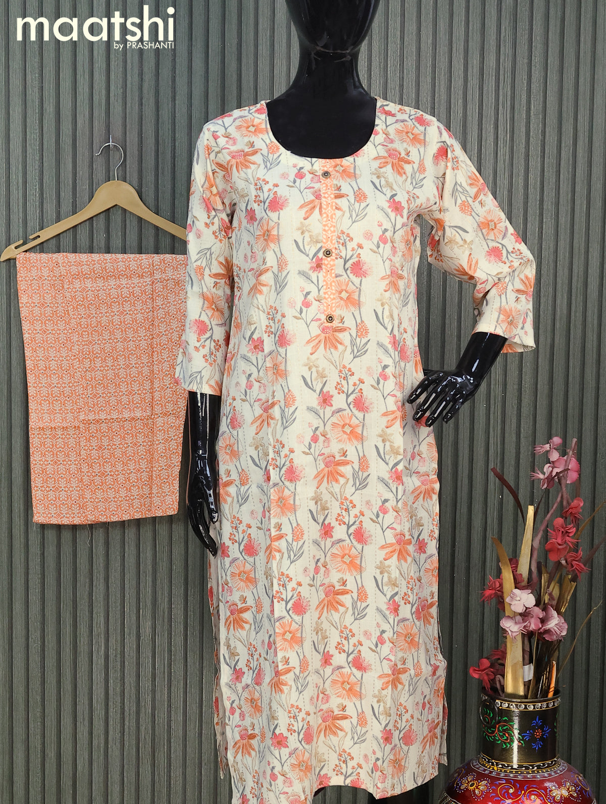 Rayon readymade kurti set cream and peach orange with allover floral prints & simple neck pattern and straight cut pant