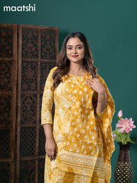 Cotton readymade salwar suit yellow shade with allover prints & embroidery lace work neck pattern and straight cut pant & cotton dupatta