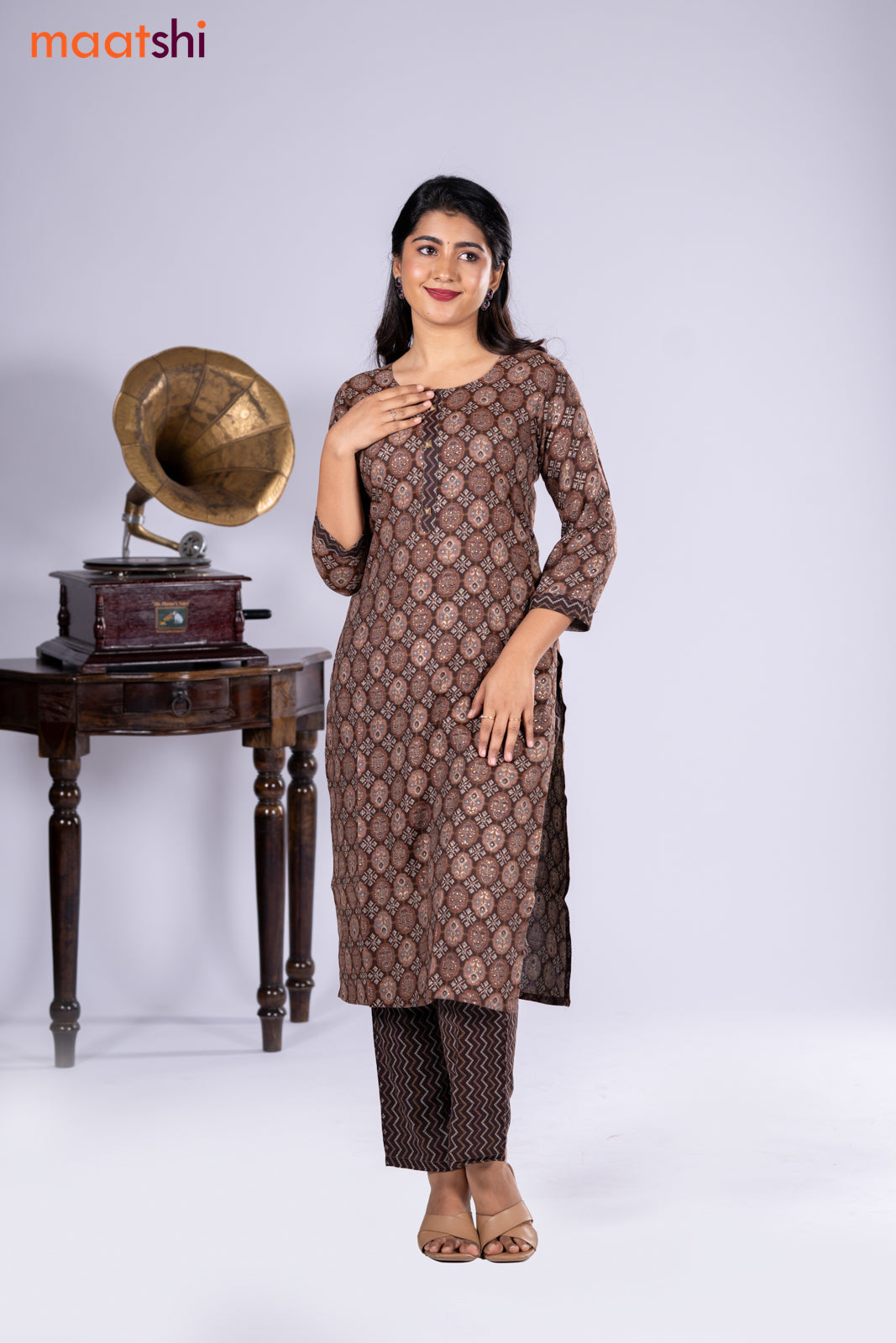 Rayon kurti pastel brown and brown with allover prints & simple neck pattern and straight cut pant