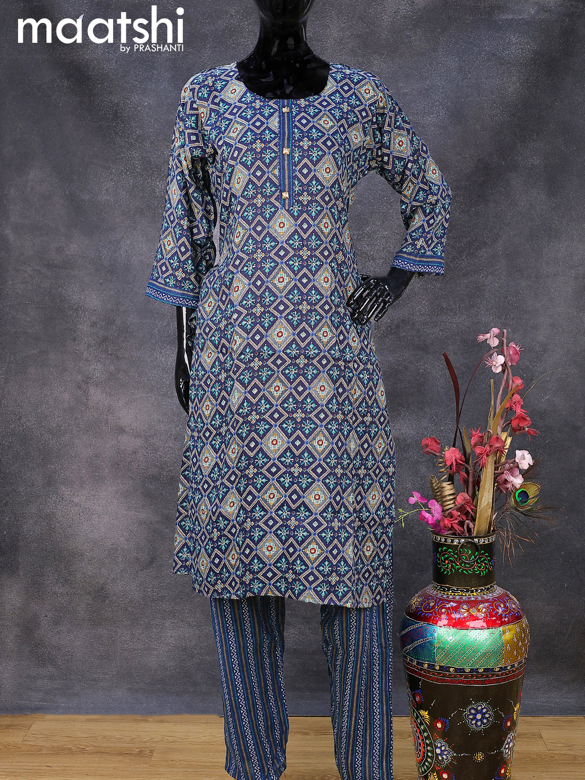 Rayon readymade kurti set navy blue with allover ikat prints & simple neck pattern and straight cut pant