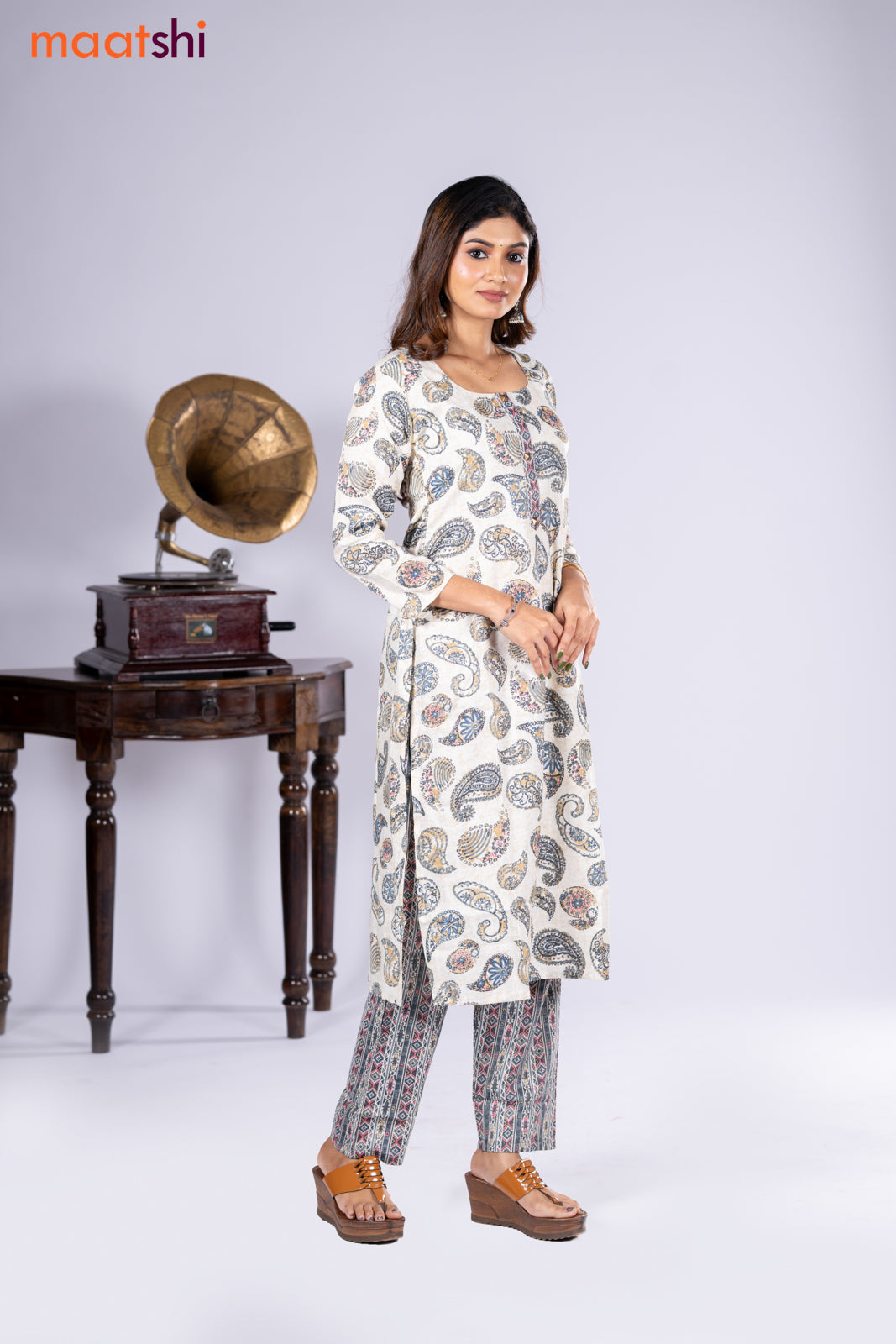 Rayon kurti cream and grey with allover paisley prints & simple neck pattern and straight cut pant