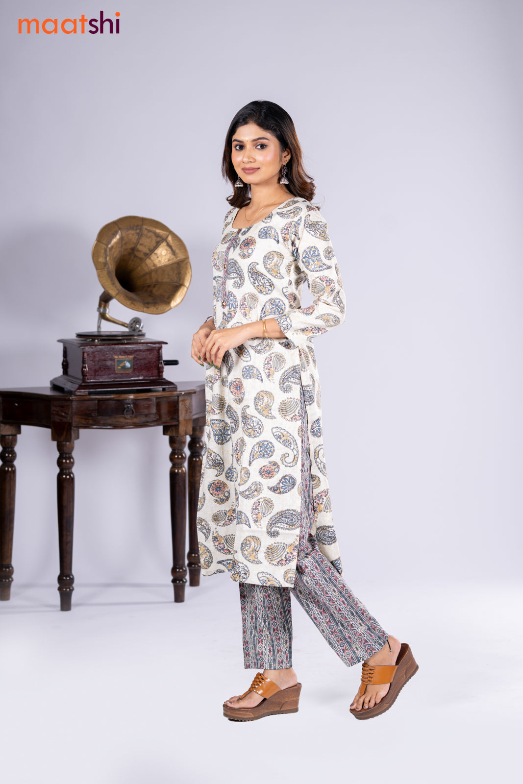 Rayon kurti cream and grey with allover paisley prints & simple neck pattern and straight cut pant