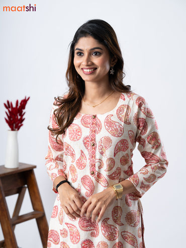 Rayon kurti set cream and red shade with allover paisley prints & simple neck pattern and straight cut pant