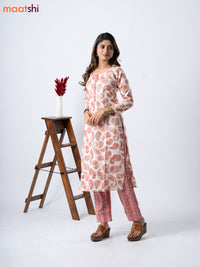 Rayon kurti set cream and red shade with allover paisley prints & simple neck pattern and straight cut pant