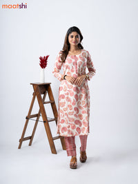 Rayon kurti set cream and red shade with allover paisley prints & simple neck pattern and straight cut pant