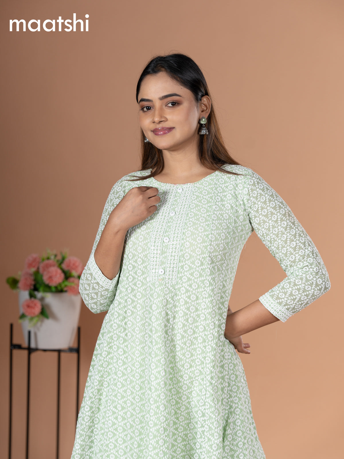 Georgette readymade anarkali kurti pastel green with allover chikankari work & simple neck pattern and without pant