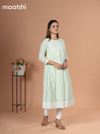 Georgette readymade anarkali kurti pastel green with allover chikankari work & simple neck pattern and without pant