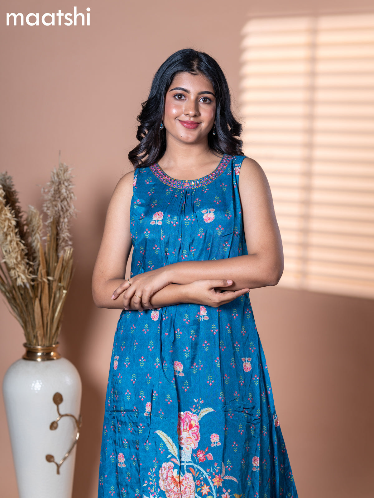 Muslin dress blue shade with allover floral prints & embroidery neck pattern and without pant & sleeve attached