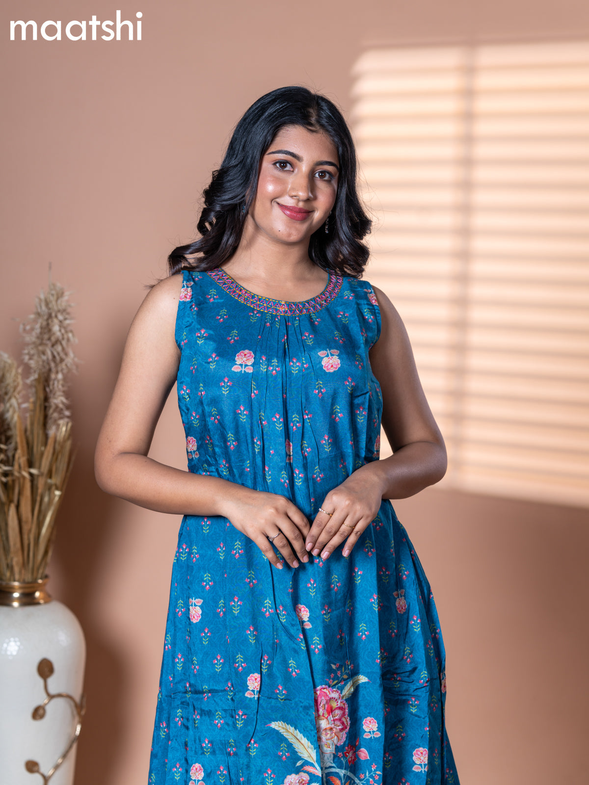 Muslin dress blue shade with allover floral prints & embroidery neck pattern and without pant & sleeve attached