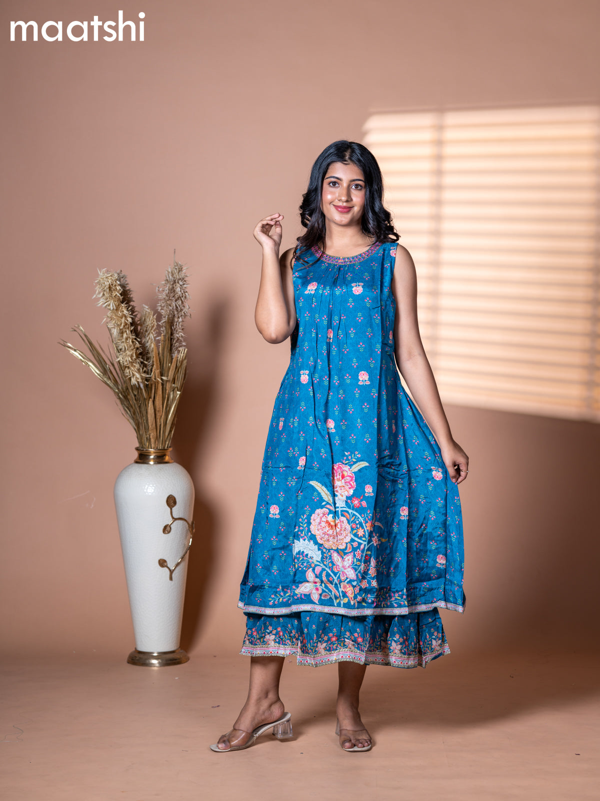 Muslin dress blue shade with allover floral prints & embroidery neck pattern and without pant & sleeve attached