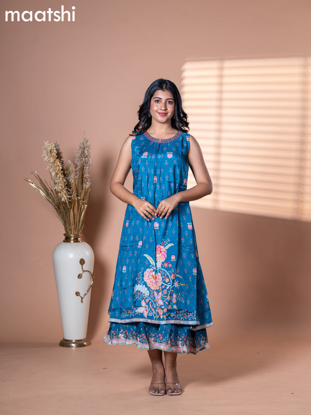 Muslin dress blue shade with allover floral prints & embroidery neck pattern and without pant & sleeve attached