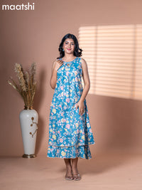 Cotton dress blue shade with allover floral prints & embroidery neck pattern and without pant & sleeve attached