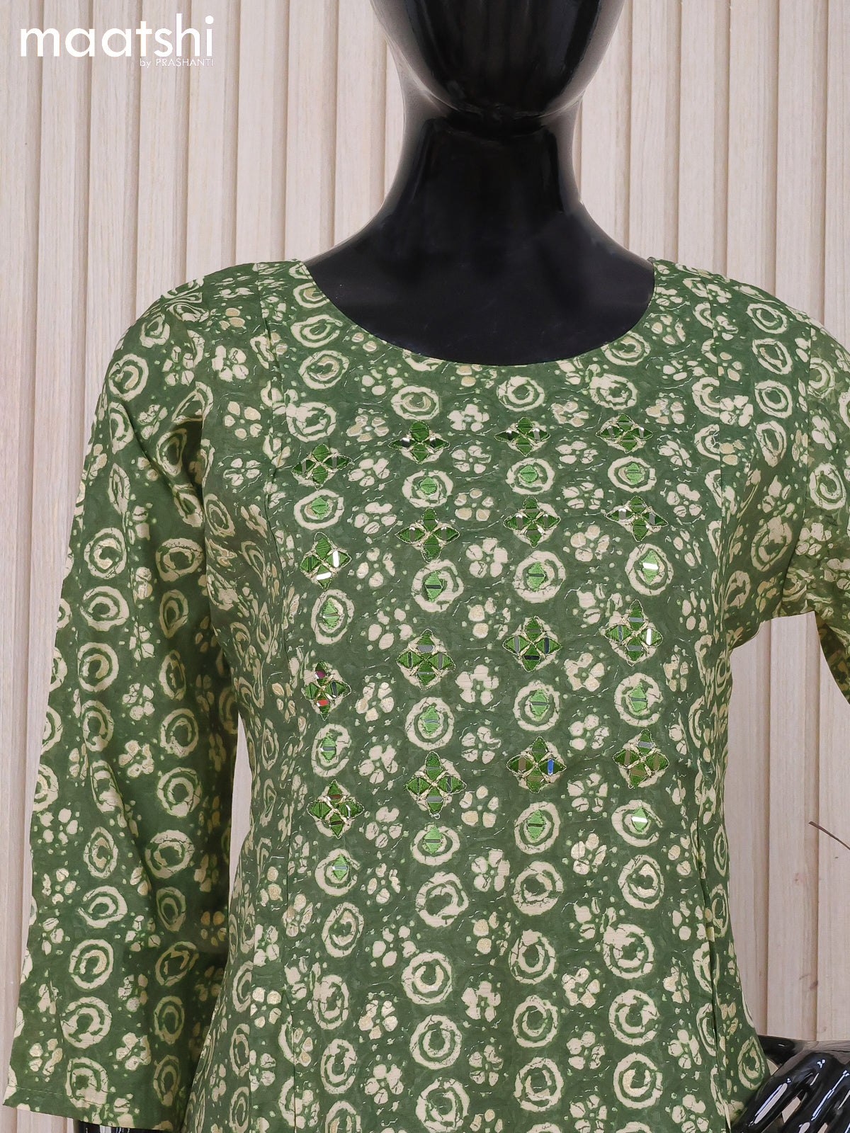 Muslin readymade kurti green and with allover batik prints & mirror work neck pattern and without pant