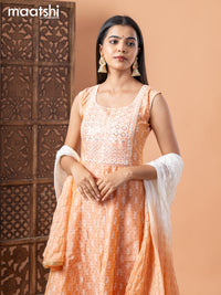 Raw silk anarkali salwar suit pale orange with allover prints & sequin work neck pattern and straight cut pant & sequin work dupatta - sleeves attached