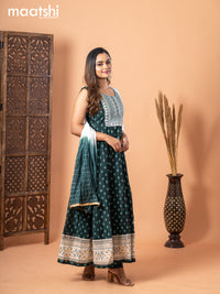 Chanderi anarkali salwar suit bottle green with butta prints & sequin work neck pattern and straight cut pant & sequin work dupatta - sleeves attached