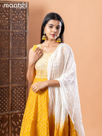 Chanderi anarkali salwar suit mustard yellow and off white with allover butta prints & sequin work neck pattern and straight cut pant & chiffon dupatta - sleeves attached