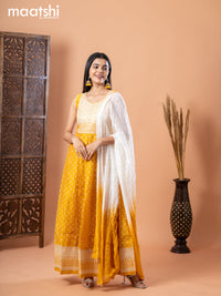 Chanderi anarkali salwar suit mustard yellow and off white with allover butta prints & sequin work neck pattern and straight cut pant & chiffon dupatta - sleeves attached