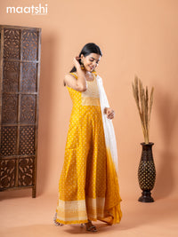 Chanderi anarkali salwar suit mustard yellow and off white with allover butta prints & sequin work neck pattern and straight cut pant & chiffon dupatta - sleeves attached