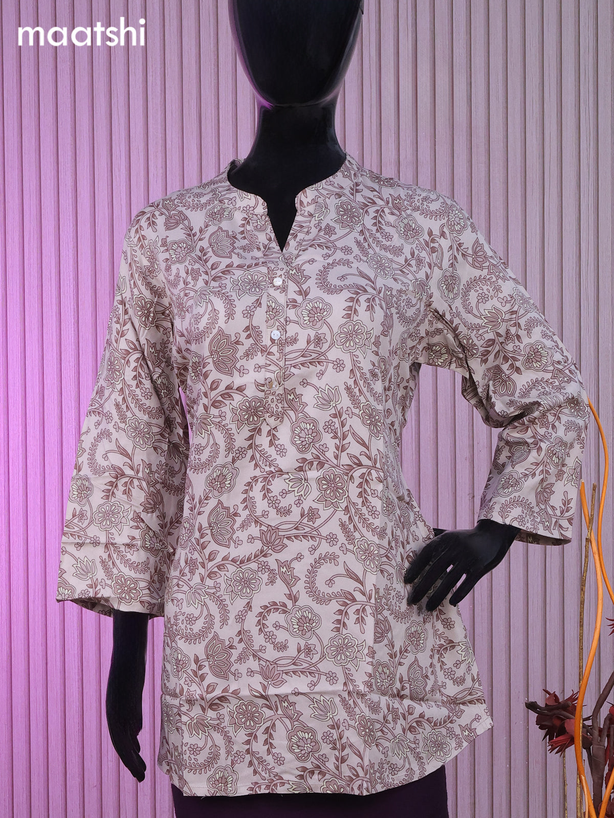 Soft cotton readymade short kurti pastel shade of pink with allover floral prints & collar neck pattern without bottom