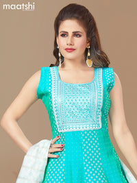 Raw silk readymade anarkali salwar suit dual shade of bluish green and off white with allover prints & embroidery sequin work neck pattern and straight cut pant & printed dupatta- Sleeves Attached