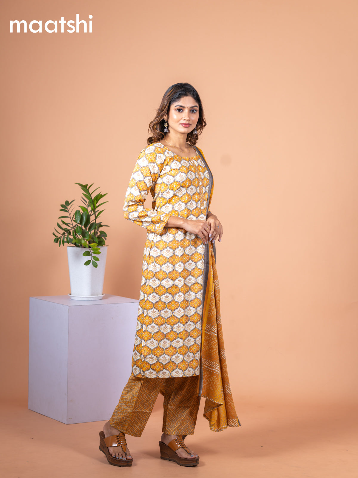 Rayon cotton salwar suit mustard yellow and off white with allover prints & mirror work neck pattern and straight cut pant & dupatta