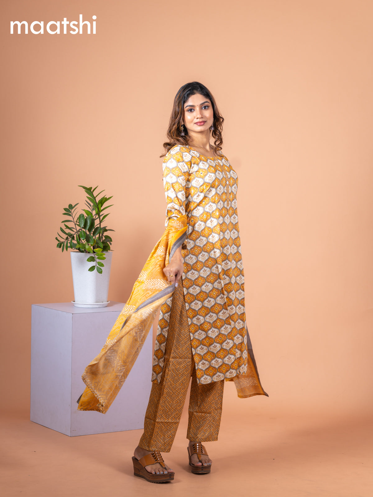 Rayon cotton salwar suit mustard yellow and off white with allover prints & mirror work neck pattern and straight cut pant & dupatta