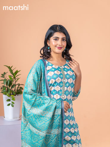 Rayon cotton salwar suit teal blue and off white with allover prints & mirror work neck pattern and straight cut pant & dupatta